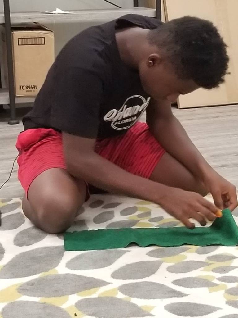 A picture containing person, child, indoor

Description automatically generated